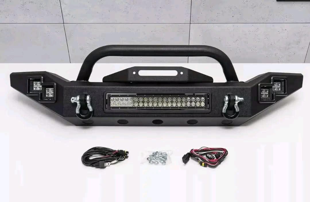 WhatsApp Image 2025-12-05 at 8.55.14 PM A heavy-duty, off-road front bumper designed for a Jeep Wrangler JK. - Image 1
