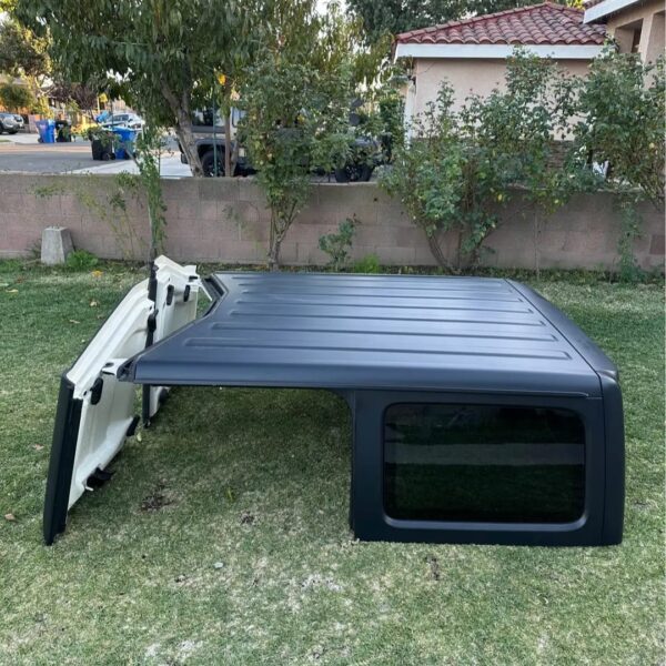 A three-piece hardtop designed for a Jeep Wrangler JL Unlimited.