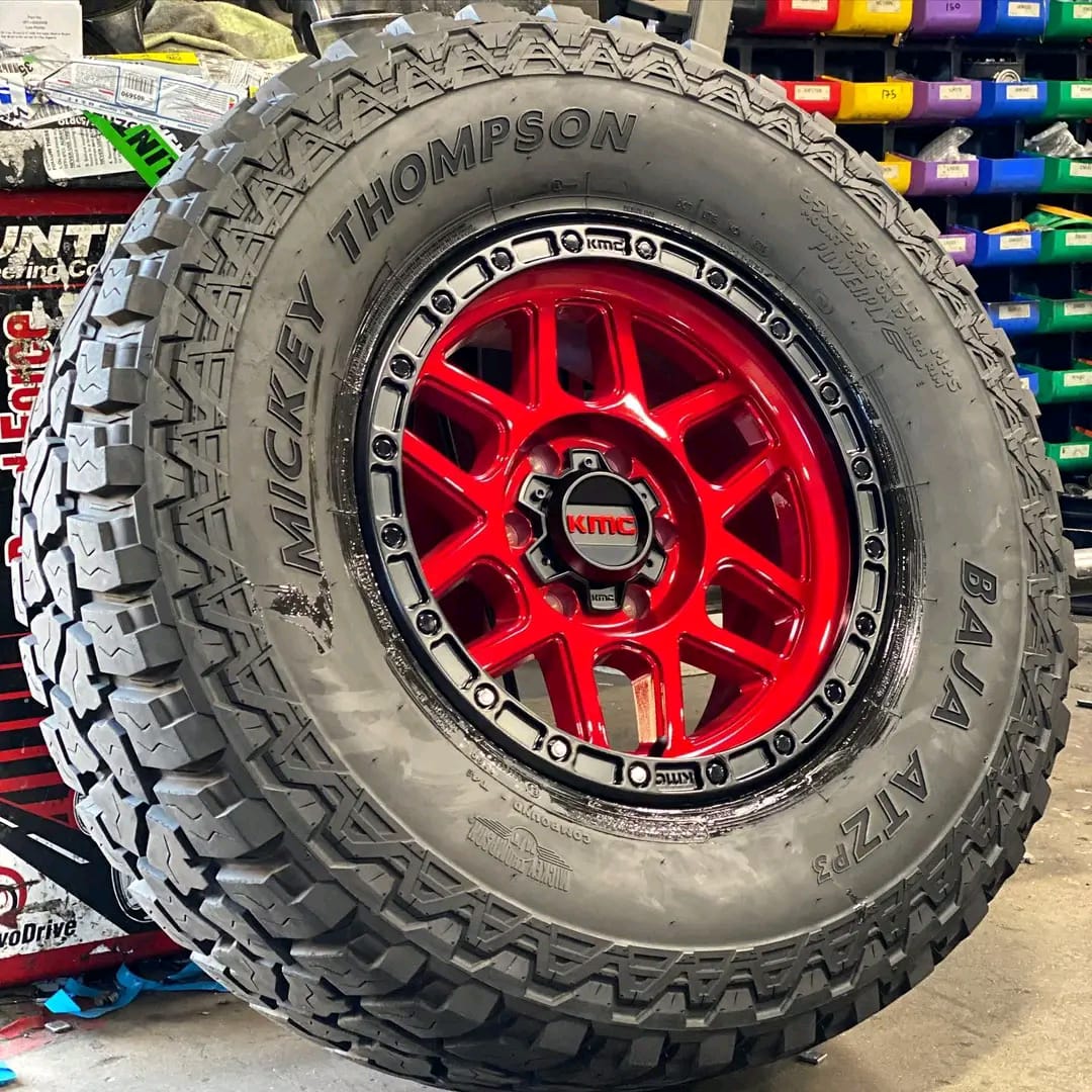 WhatsApp Image 2025-12-05 at 9.08.01 PM A set of 5 KMC KM544 Mesa wheel in a "Candy Red" finish with a black lip - Image 1