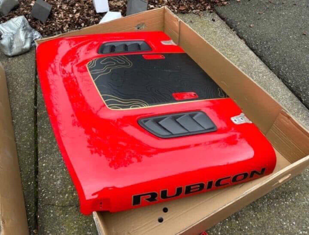 WhatsApp Image 2025-12-05 at 9.47.11 PM Jeep Wrangler Rubicon hood in Firecracker Red Clearcoat. - Image 1