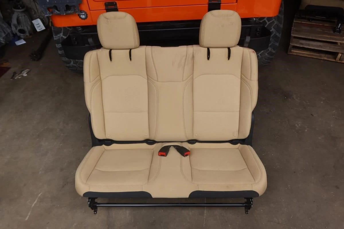 WhatsApp Image 2025-12-05 at 9.57.29 PM 2018-2025 Jeep Wrangler JL 2 Door OEM Rear Seat Cloth Tan Brown. - Image 1