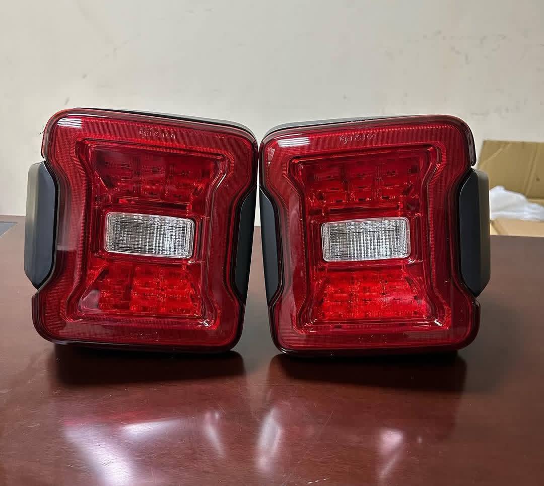WhatsApp Image 2025-12-06 at 7.20.46 AM LED tail lights designed for a Jeep Wrangler JL. - Image 1